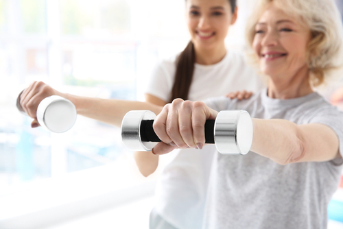 woman exercising in physical therapy