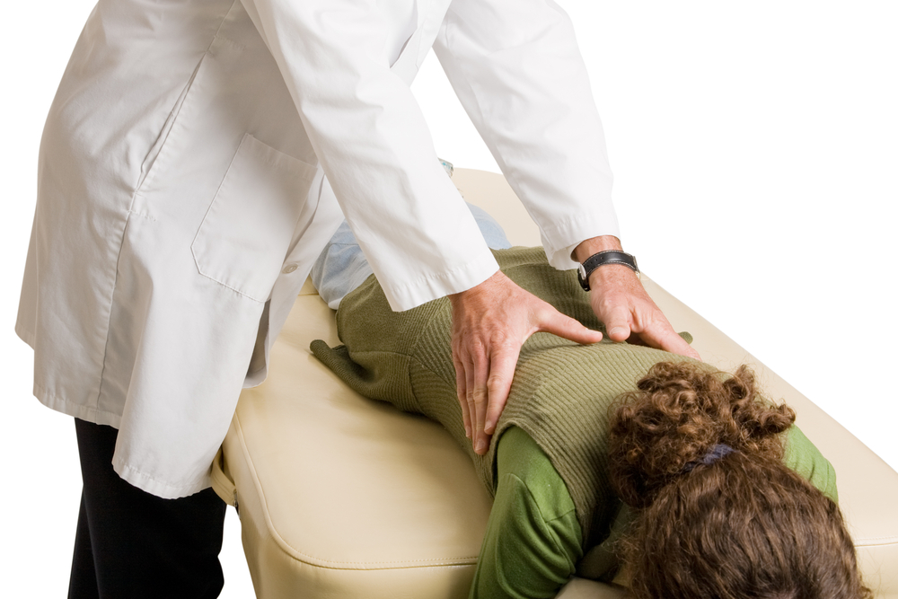 woman receiving chiropractic adjustment